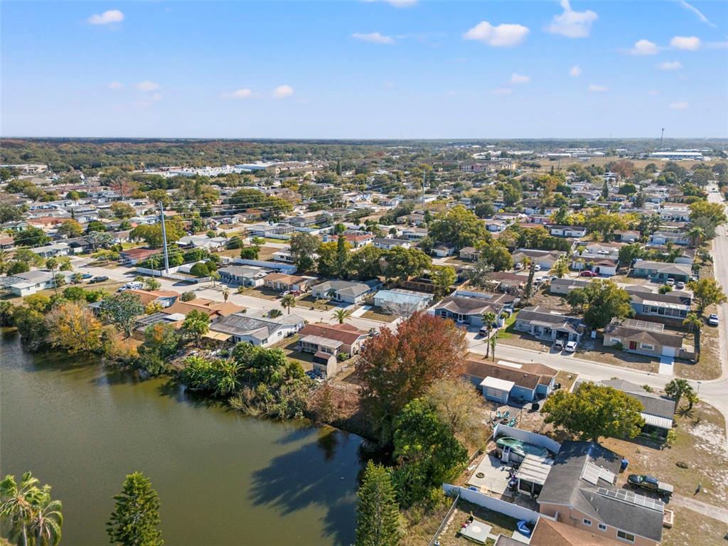 8025 Durham Drive Port Richey, FL 34668 - Photo 9 of 30 an aerial view of a city with ocean