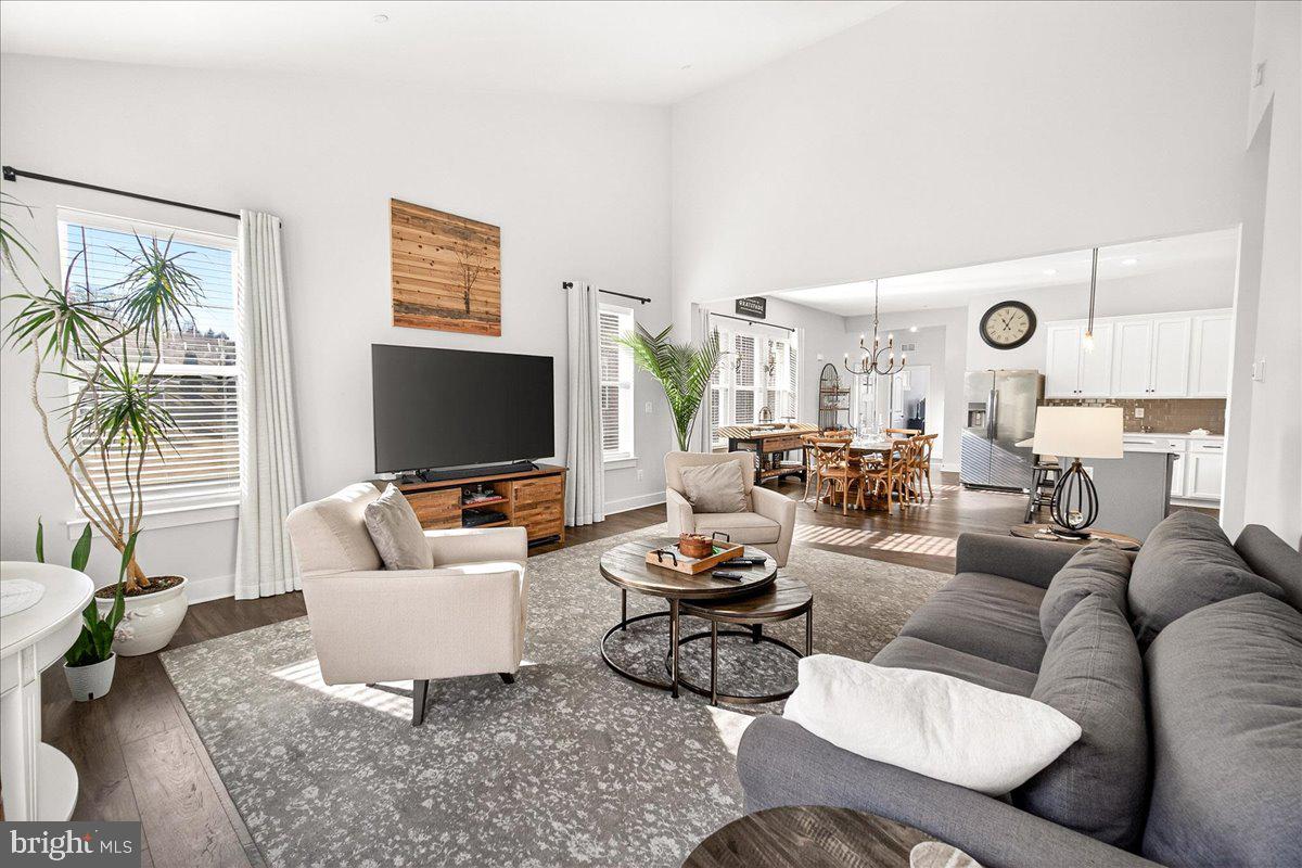 2896 Town View Circle New Windsor, MD 21776 - Photo 13 of 45 a living room with furniture and a flat screen tv