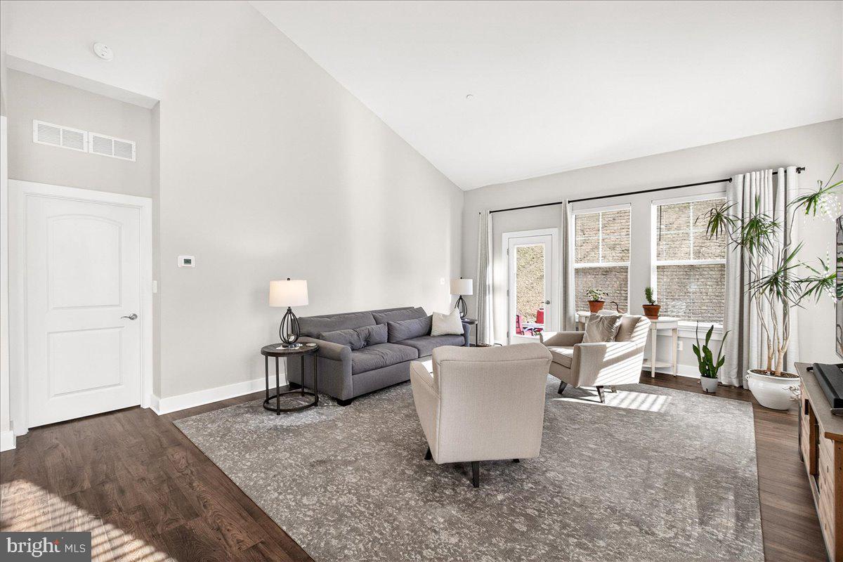 2896 Town View Circle New Windsor, MD 21776 - Photo 15 of 45 a living room with furniture and a large window