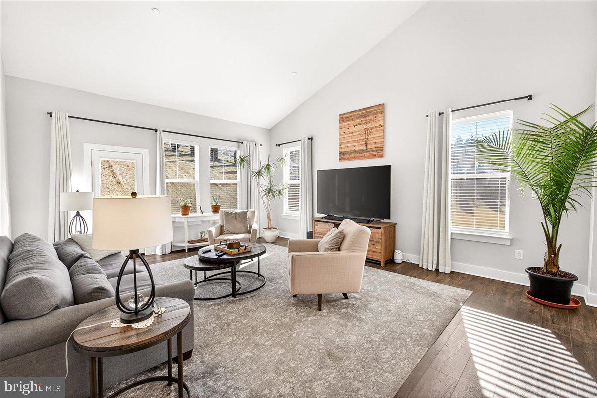 2896 Town View Circle New Windsor, MD 21776 - Photo 16 of 45 a living room with furniture and a flat screen tv