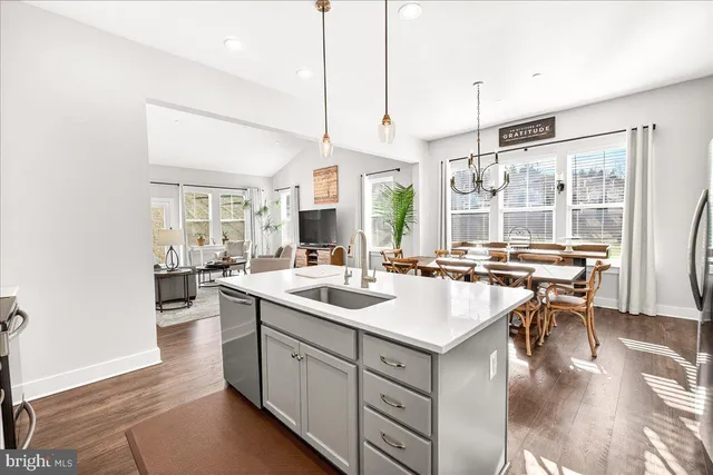 a kitchen with a sink and stove