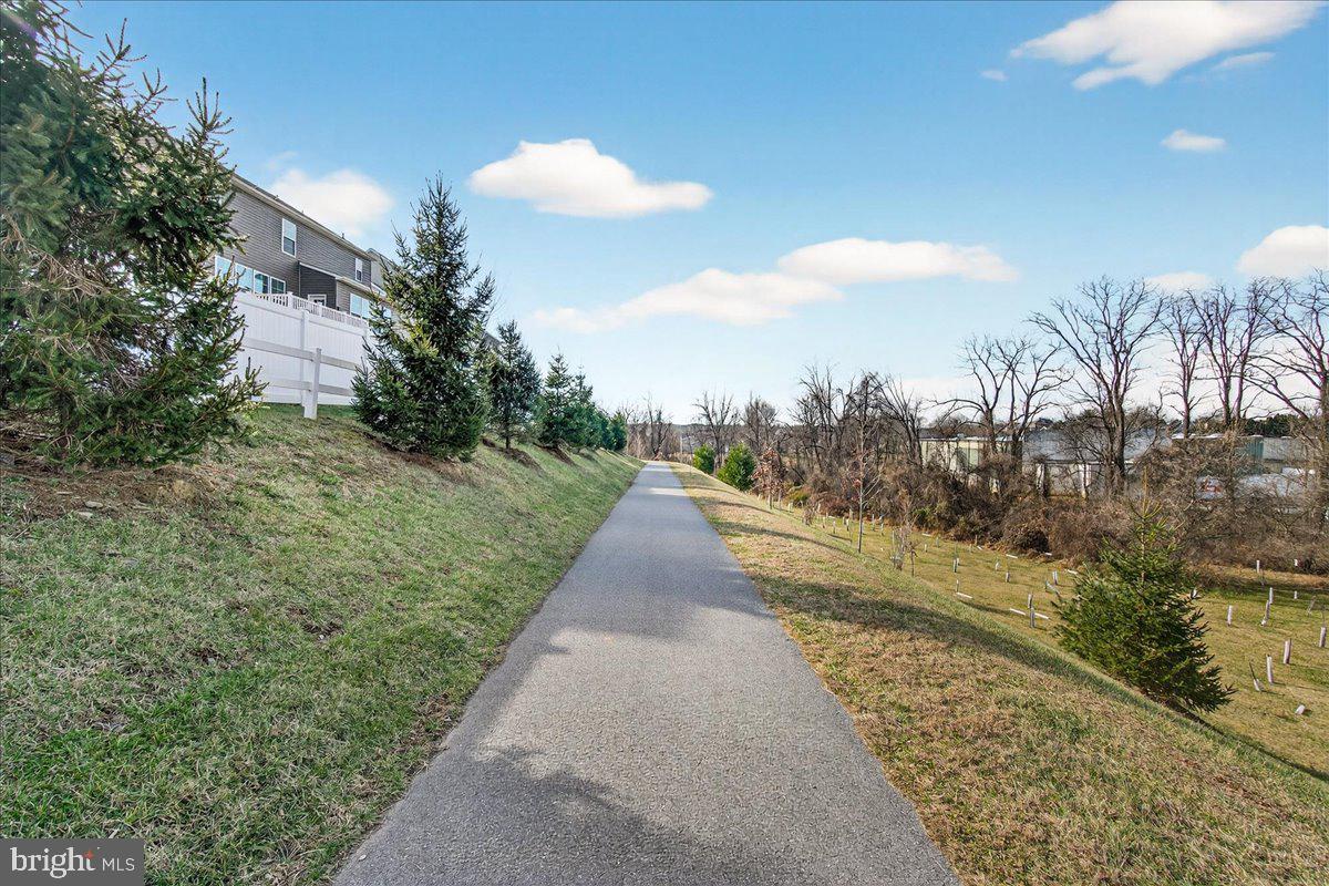 2896 Town View Circle New Windsor, MD 21776 - Photo 37 of 45 a view of a pathway both side of building