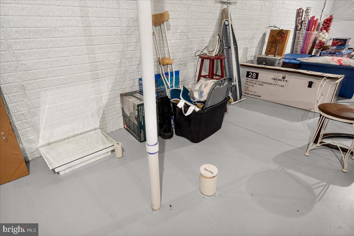 2896 Town View Circle New Windsor, MD 21776 - Photo 39 of 45 a view of a storage and utility room with washer and dryer