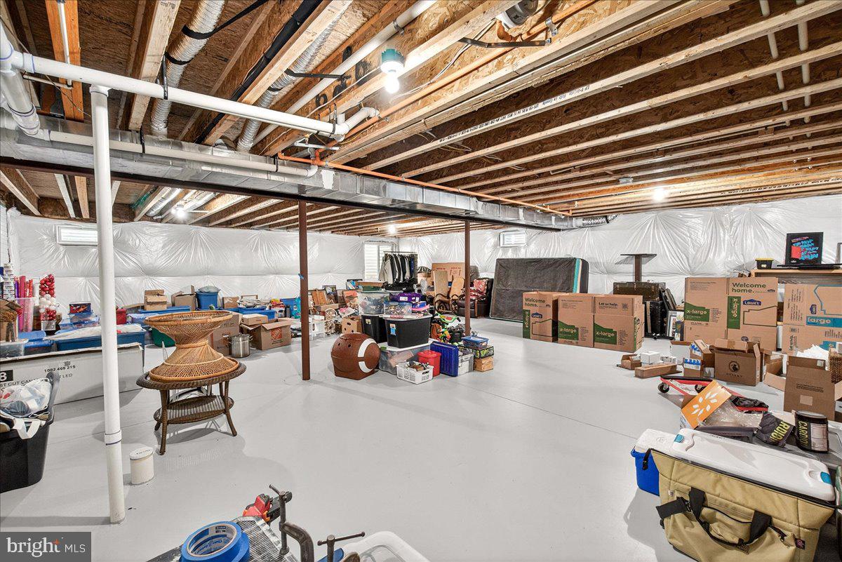2896 Town View Circle New Windsor, MD 21776 - Photo 40 of 45 a view of a garage with storage and utility