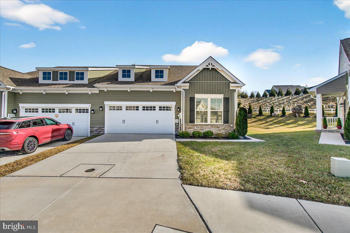 2896 Town View Circle New Windsor, MD 21776 - Photo 4 of 45 a front view of a house with a yard