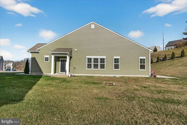 a view of a yard in front of a house