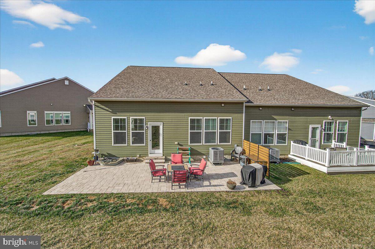 2896 Town View Circle New Windsor, MD 21776 - Photo 9 of 45 a front view of house with yard patio and fire pit