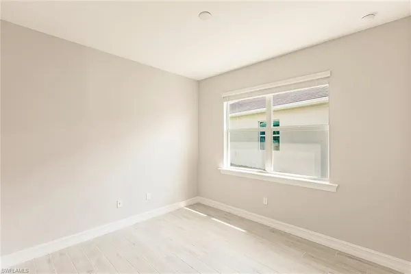 an empty room with a window
