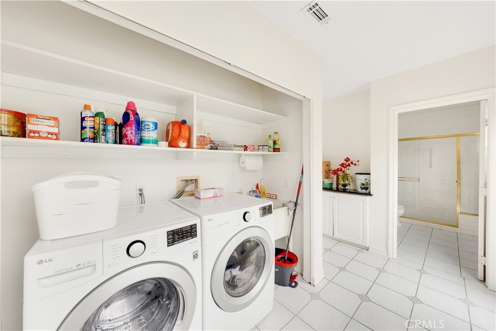 2835 Devonport Road San Marino, CA 91108 - Photo 24 of 54 a utility room with dryer and washer