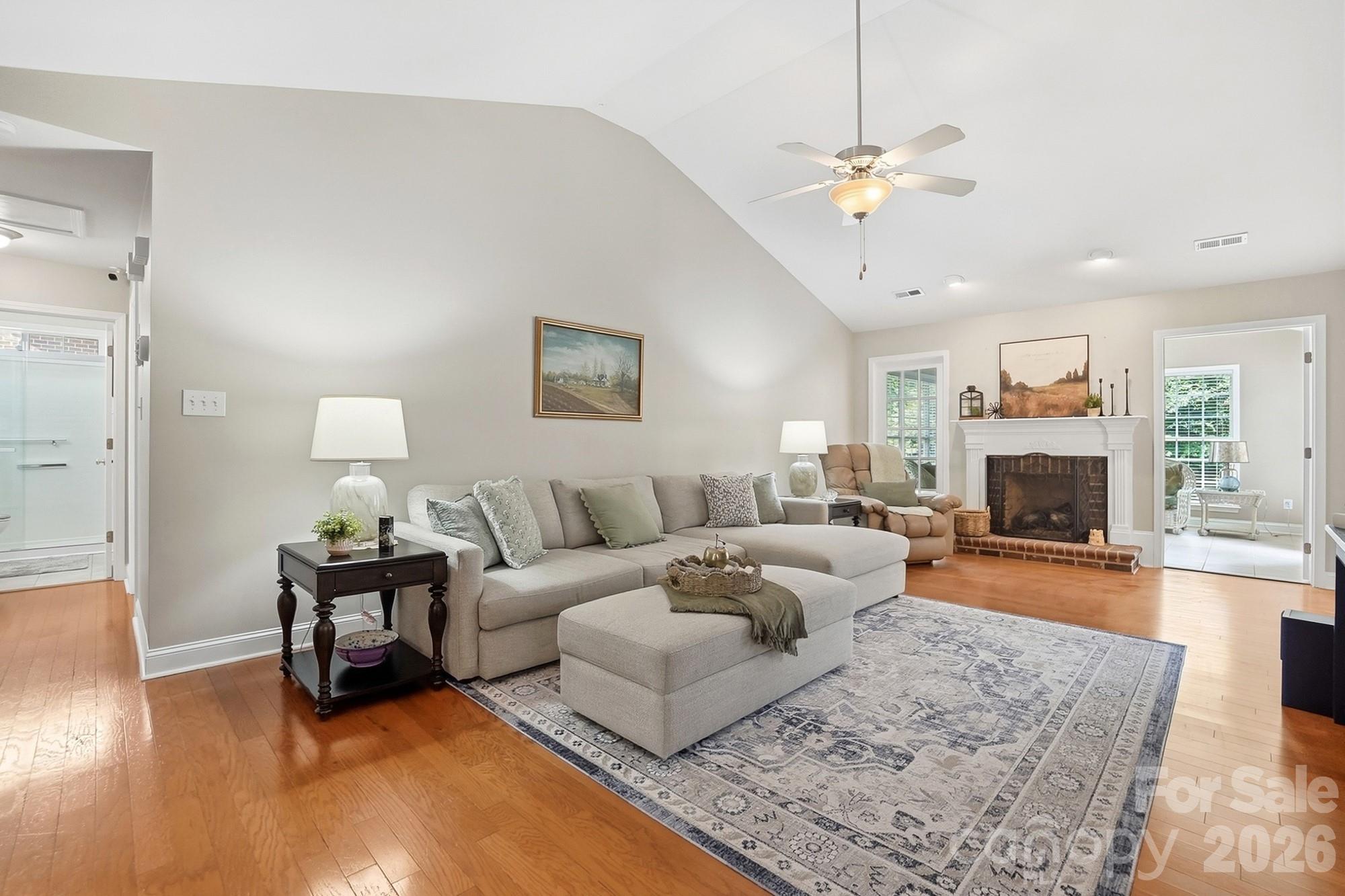 3324 Muddy Creek Road Midland, NC 28107 - Photo 6 of 46 a living room with furniture and a fireplace