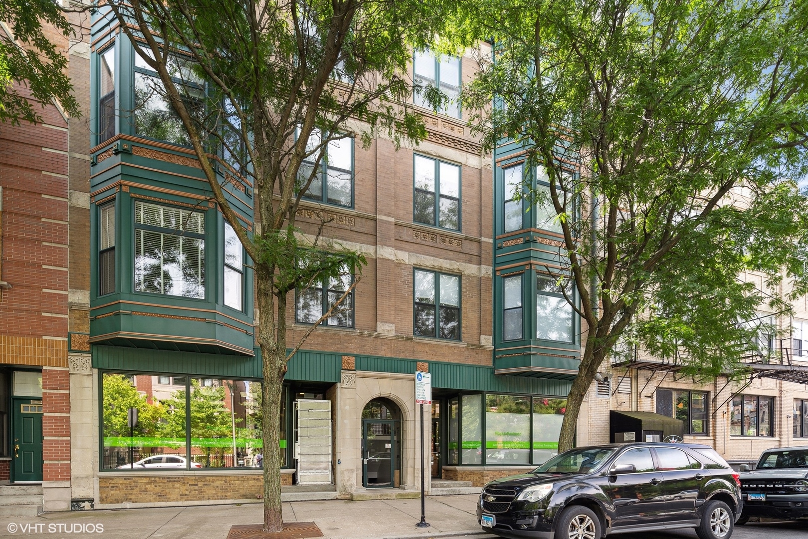 a front view of a building with street view