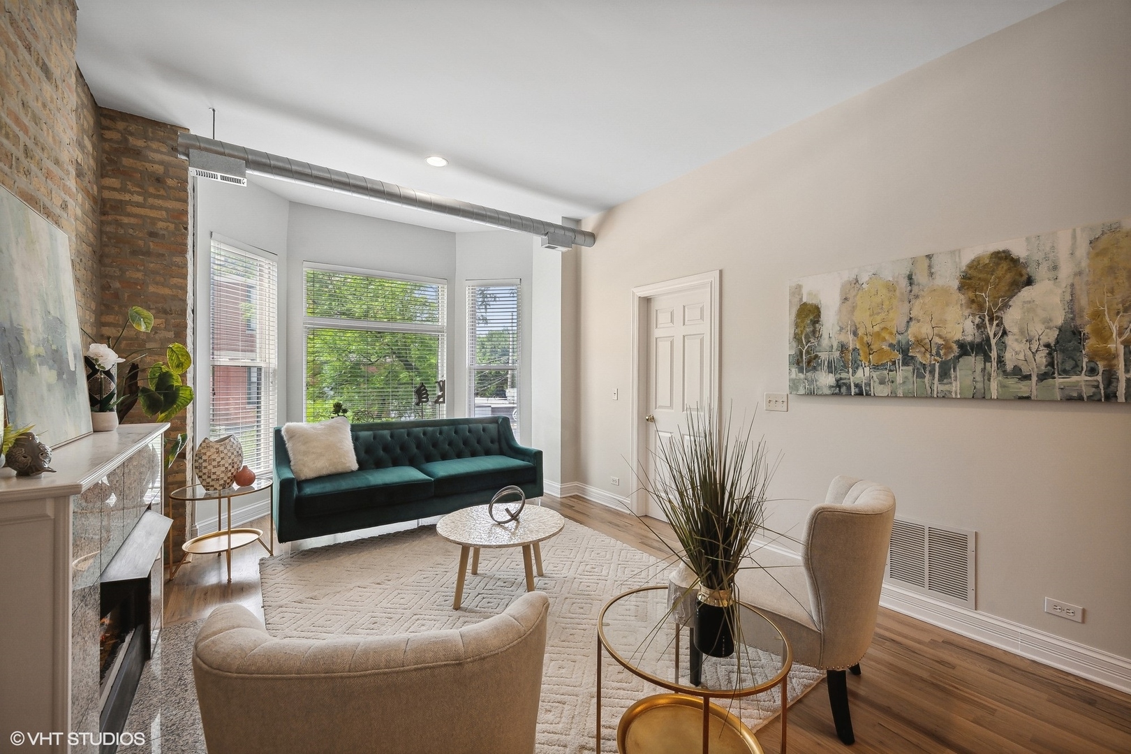 1245 West George Street, Unit 203 Chicago, IL 60657 - Photo 3 of 15 a living room with furniture and a large window