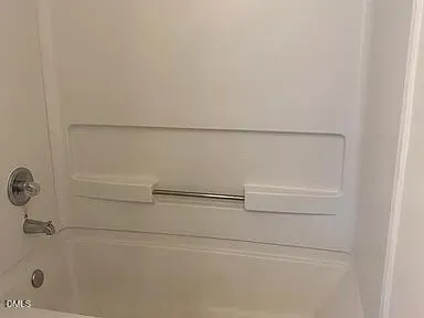 a bathroom with a toilet and a sink