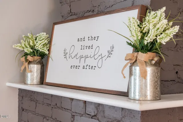 a kitchen with kitchen island granite countertop stainless steel appliances and a sink