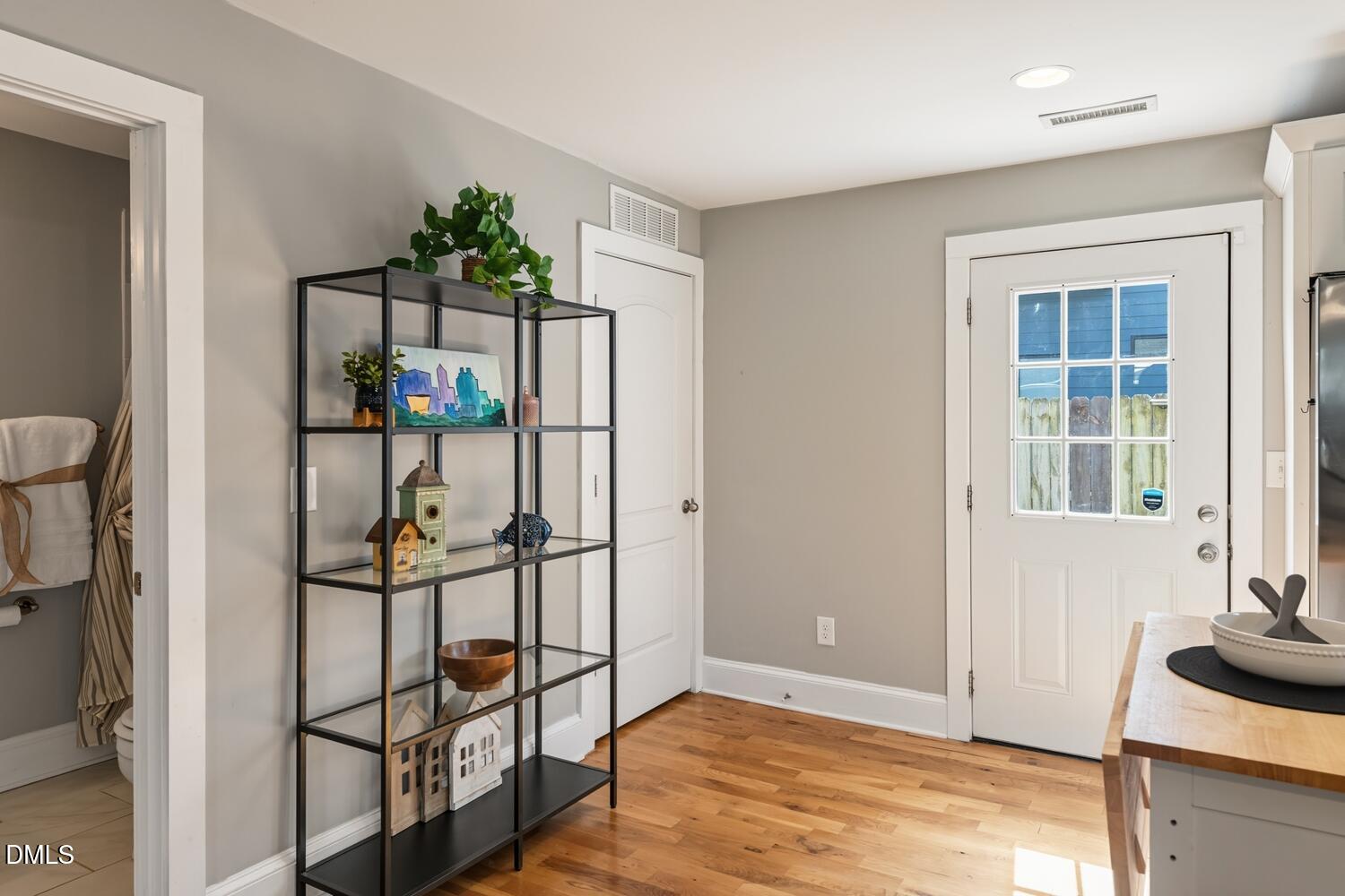 410 Bledsoe Avenue Raleigh, NC 27601 - Photo 12 of 37 a view of entryway with wooden floor