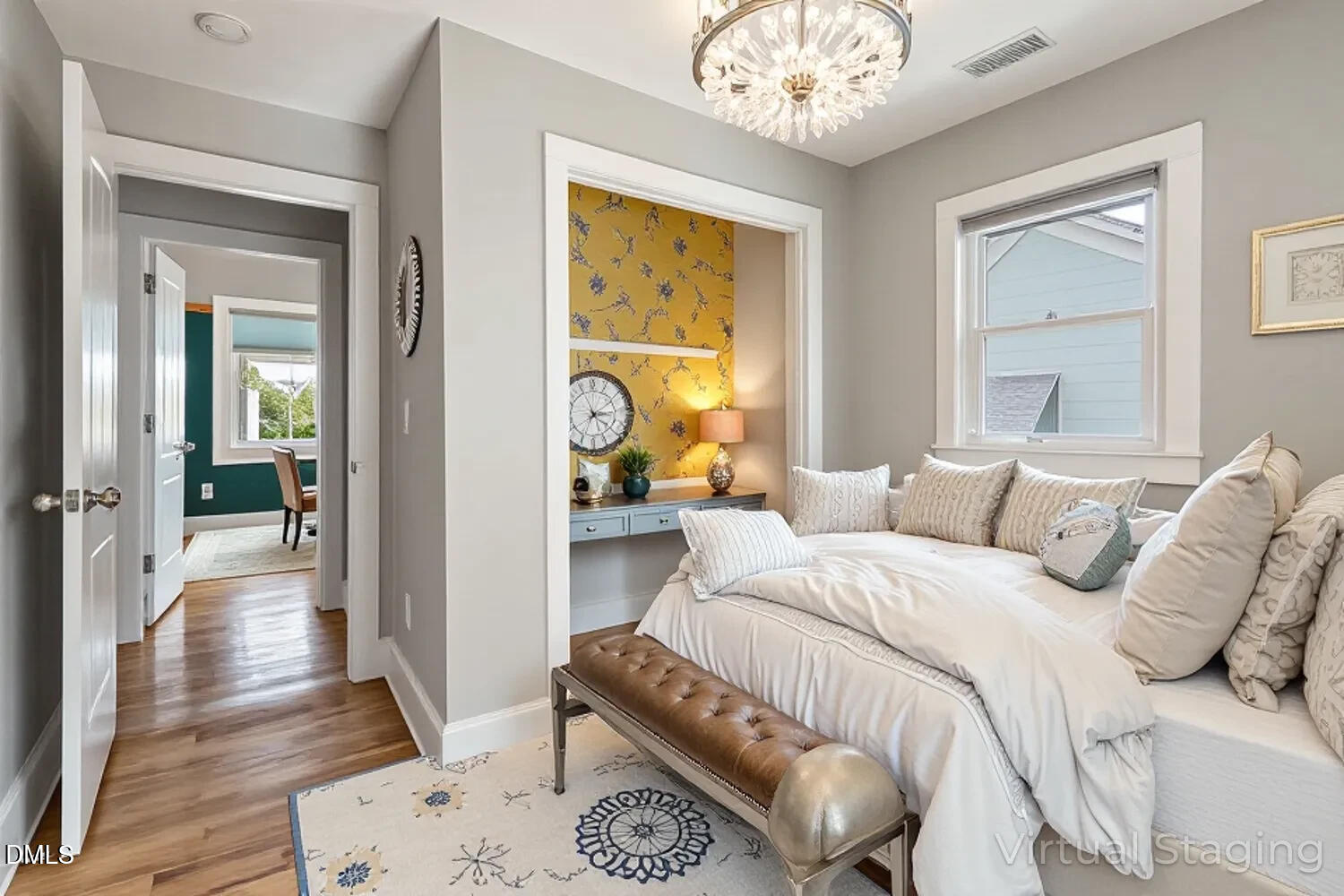 410 Bledsoe Avenue Raleigh, NC 27601 - Photo 20 of 37 a bedroom with a bed and wooden floor