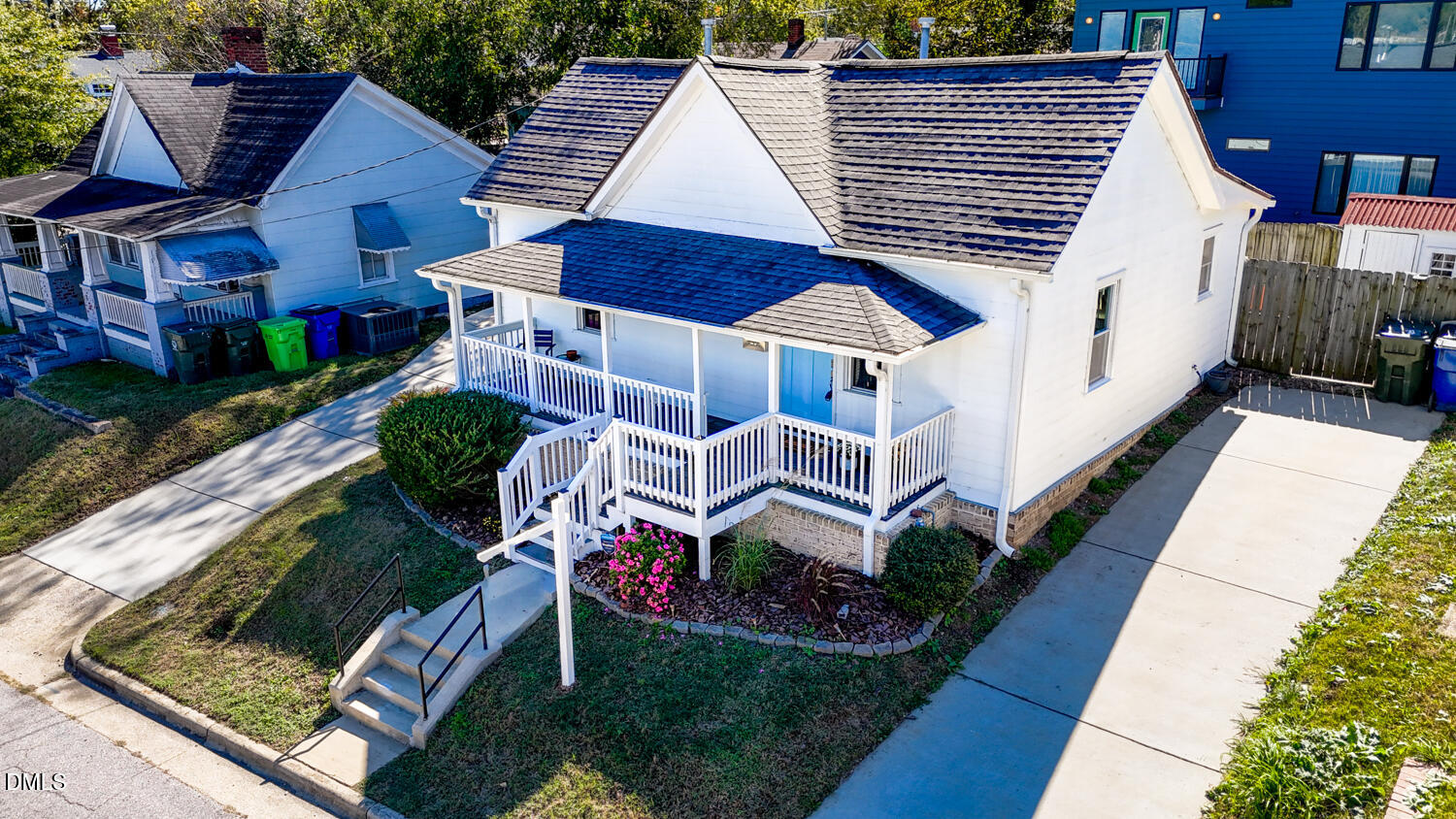 410 Bledsoe Avenue Raleigh, NC 27601 - Photo 33 of 37 a aerial view of a house with a yard and potted plants
