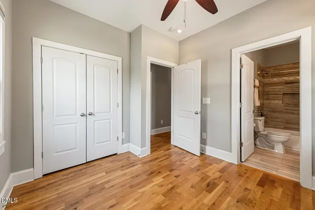 a kitchen with stainless steel appliances granite countertop a refrigerator stove a sink and a microwave