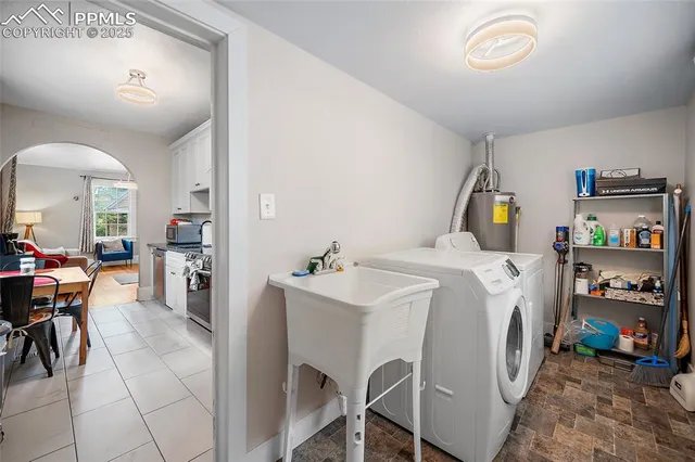 a utility room with dryer and washer