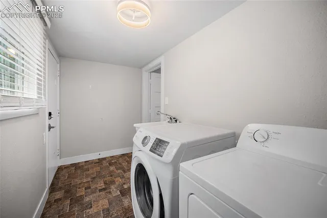 a utility room with dryer and washer