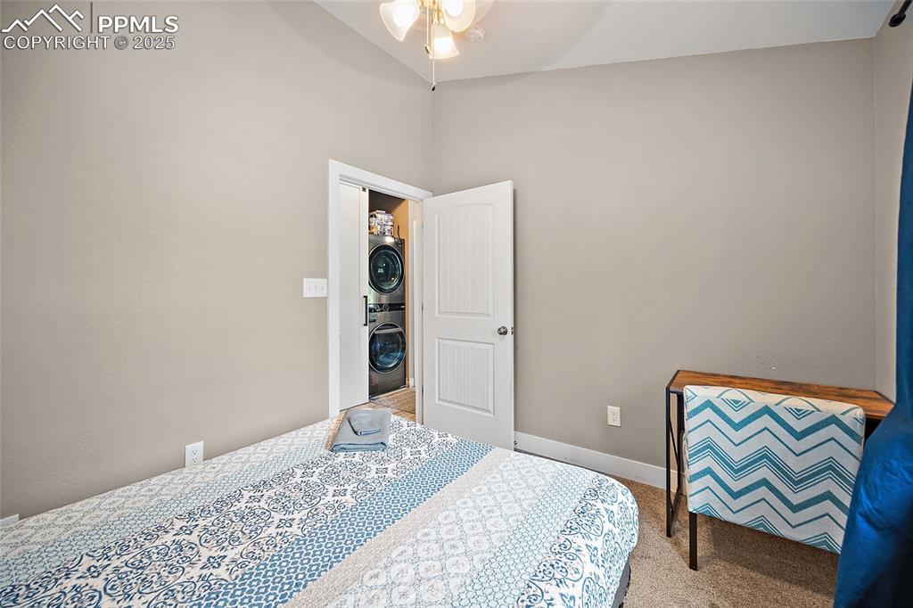 225 Custer Avenue Colorado Springs, CO 80903 - Photo 28 of 39 a bedroom with a bed and couch