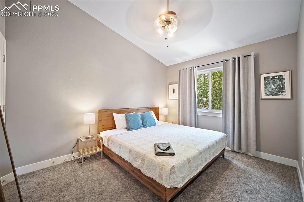 225 Custer Avenue Colorado Springs, CO 80903 - Photo 30 of 39 a bedroom with a bed and a window