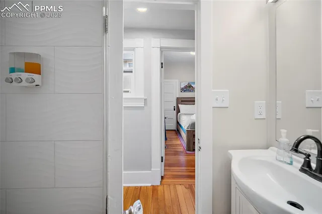 a bathroom with a sink and a shower