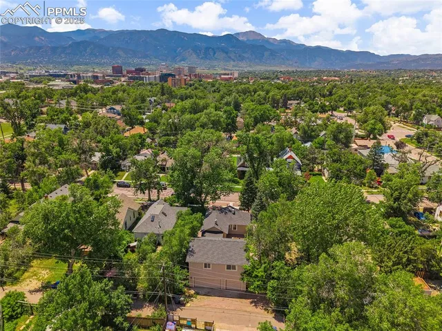 an aerial view of residential house with outdoor space