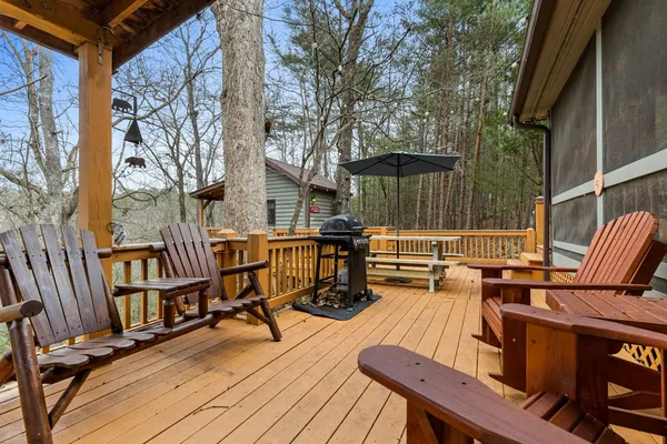 a view of a two chairs on the deck