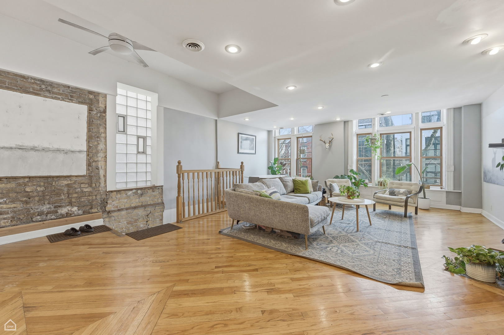 822 North Wood Street Chicago, IL 60622 - Photo 2 of 28 a living room with furniture and a large window