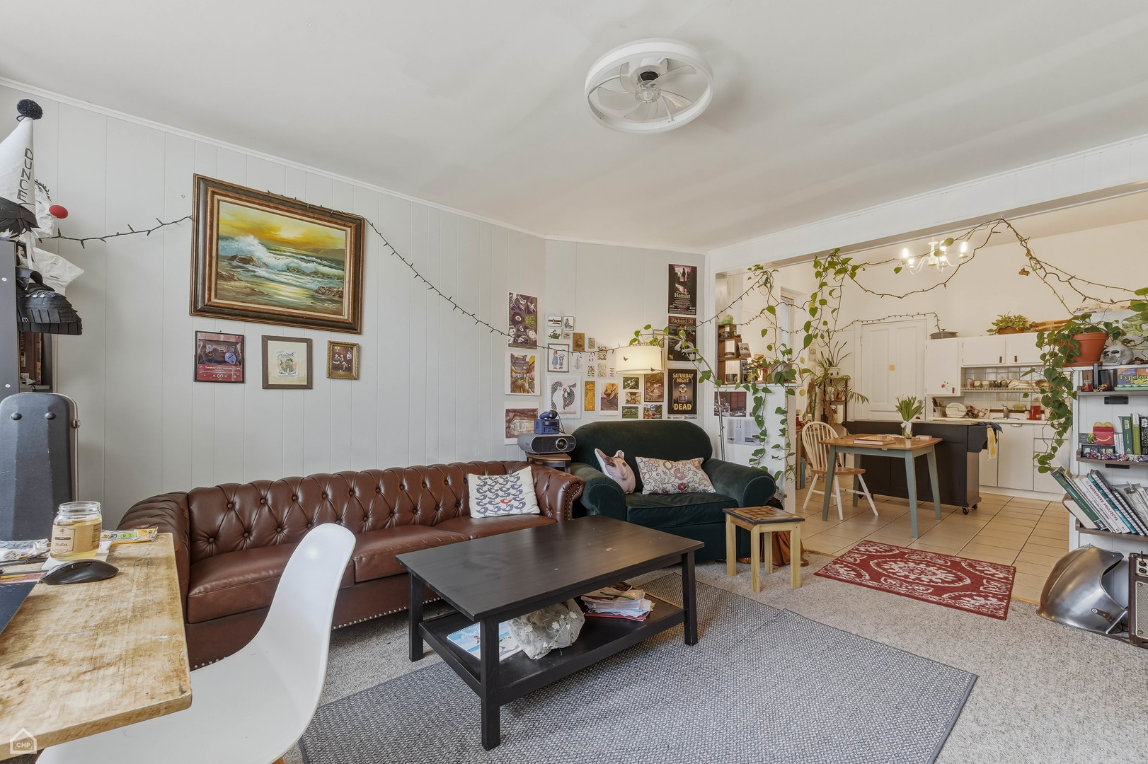 822 North Wood Street Chicago, IL 60622 - Photo 23 of 28 a living room with furniture and a flat screen tv