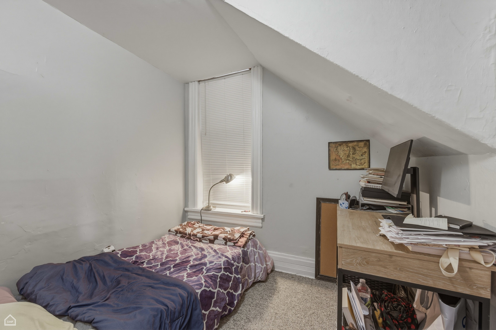 822 North Wood Street Chicago, IL 60622 - Photo 27 of 28 a bedroom with a bed and a desk