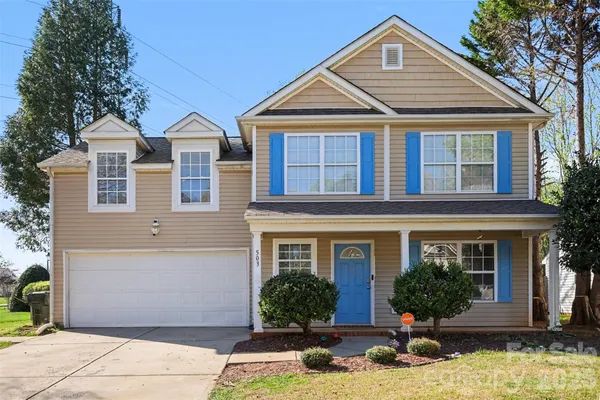 front view of a house with yard