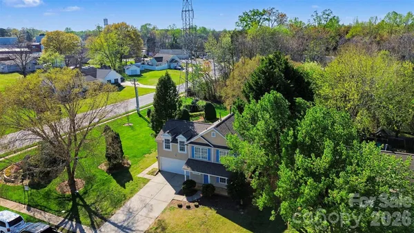 an aerial view of a house with a garden