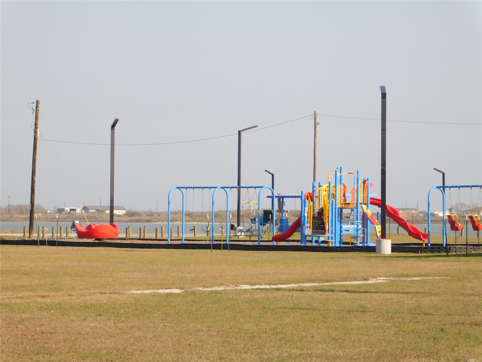 266 First Street Port Lavaca, TX 77979 - Photo 14 of 18 a view of boats and trees in the ocean