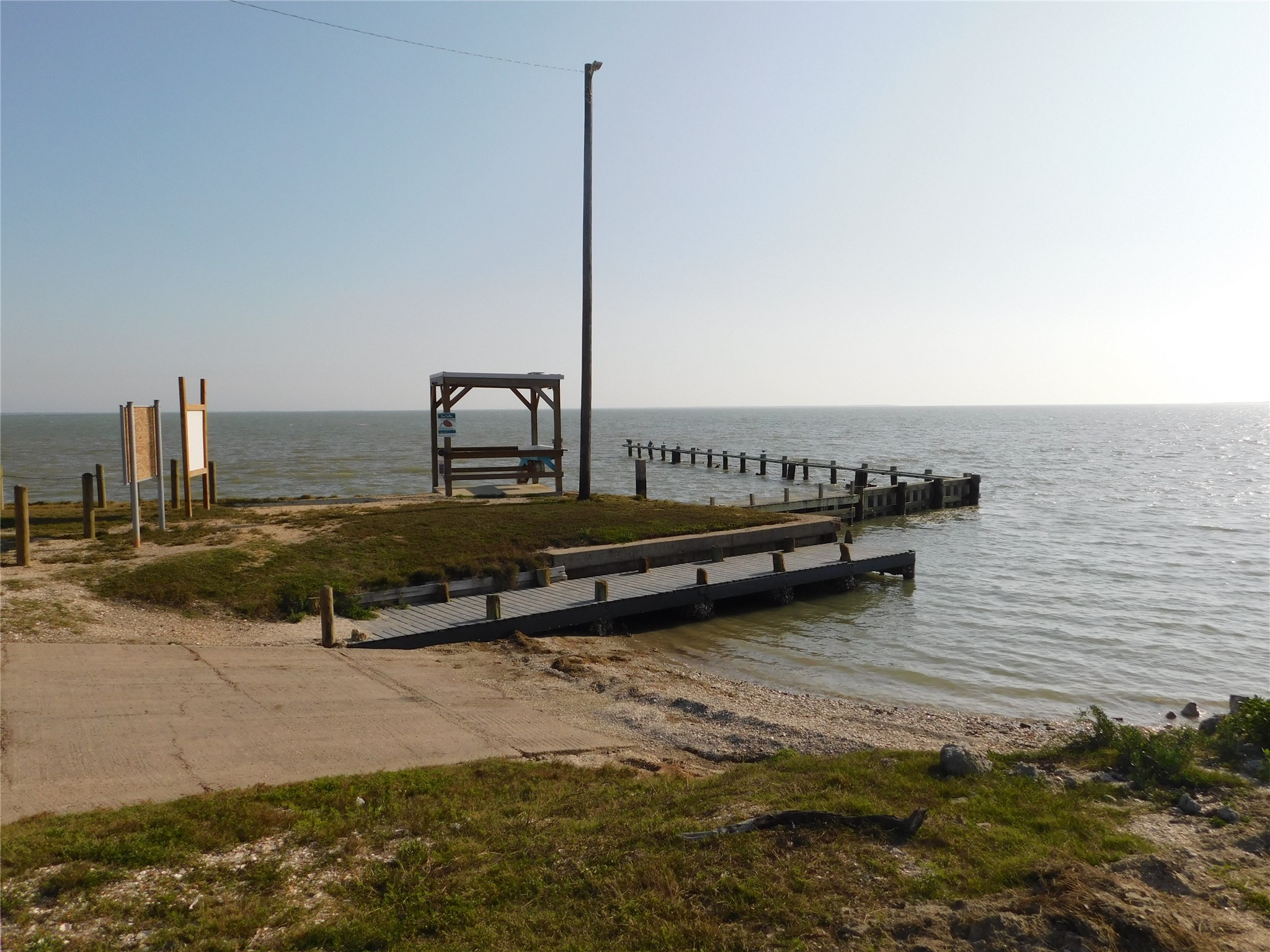 266 First Street Port Lavaca, TX 77979 - Photo 16 of 18 a view of a lake with a ocean view