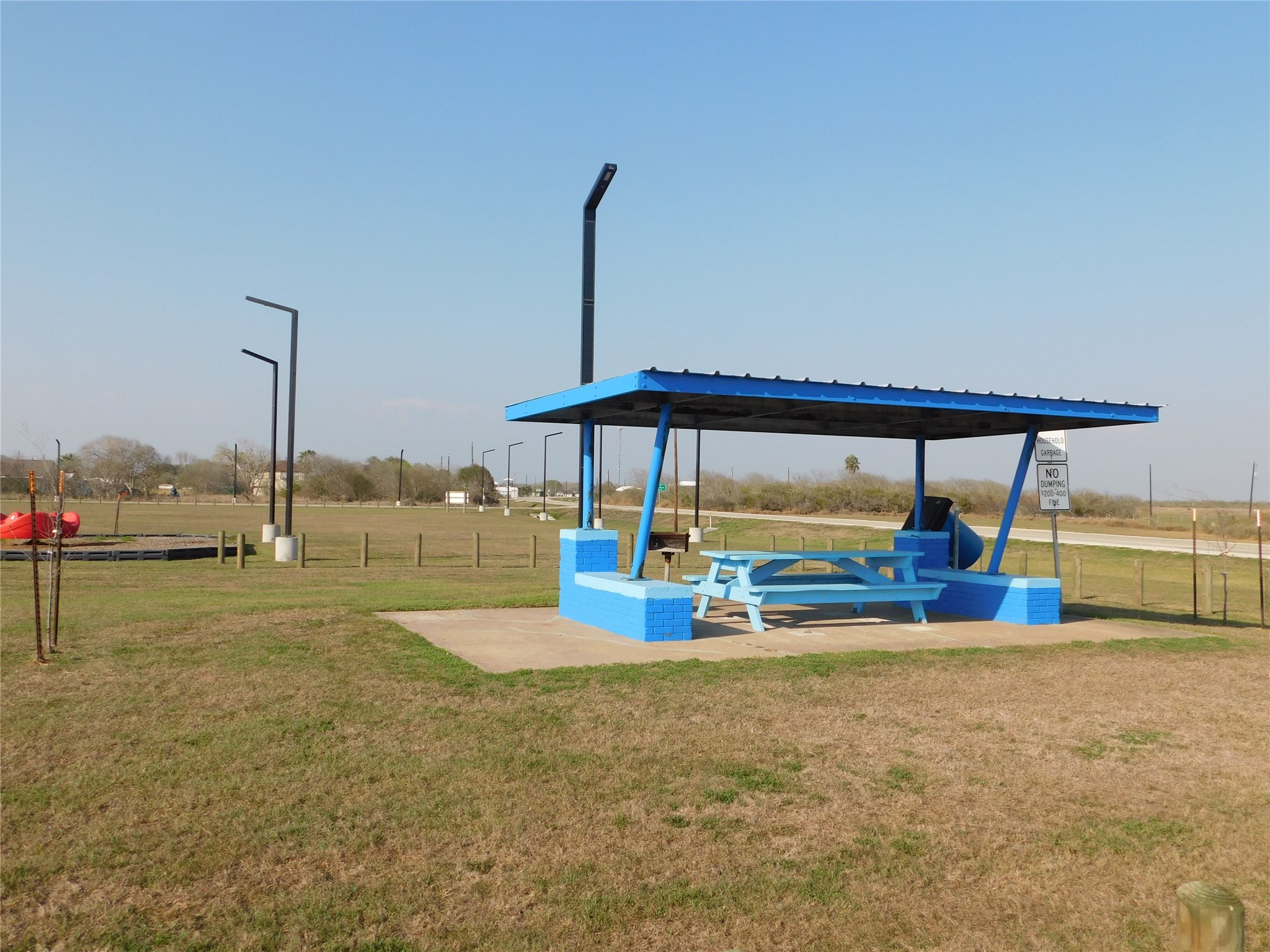 266 First Street Port Lavaca, TX 77979 - Photo 18 of 18 a view of a swimming pool with an outdoor seating