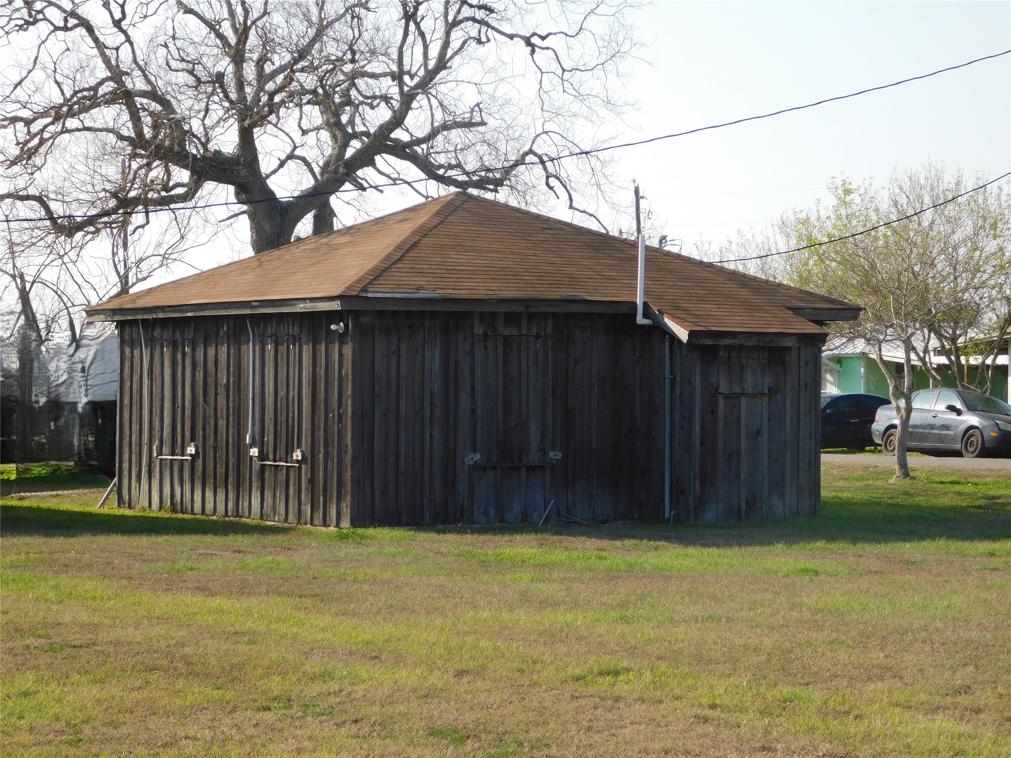 266 First Street Port Lavaca, TX 77979 - Photo 8 of 18 a wooden fence with a trees in the background