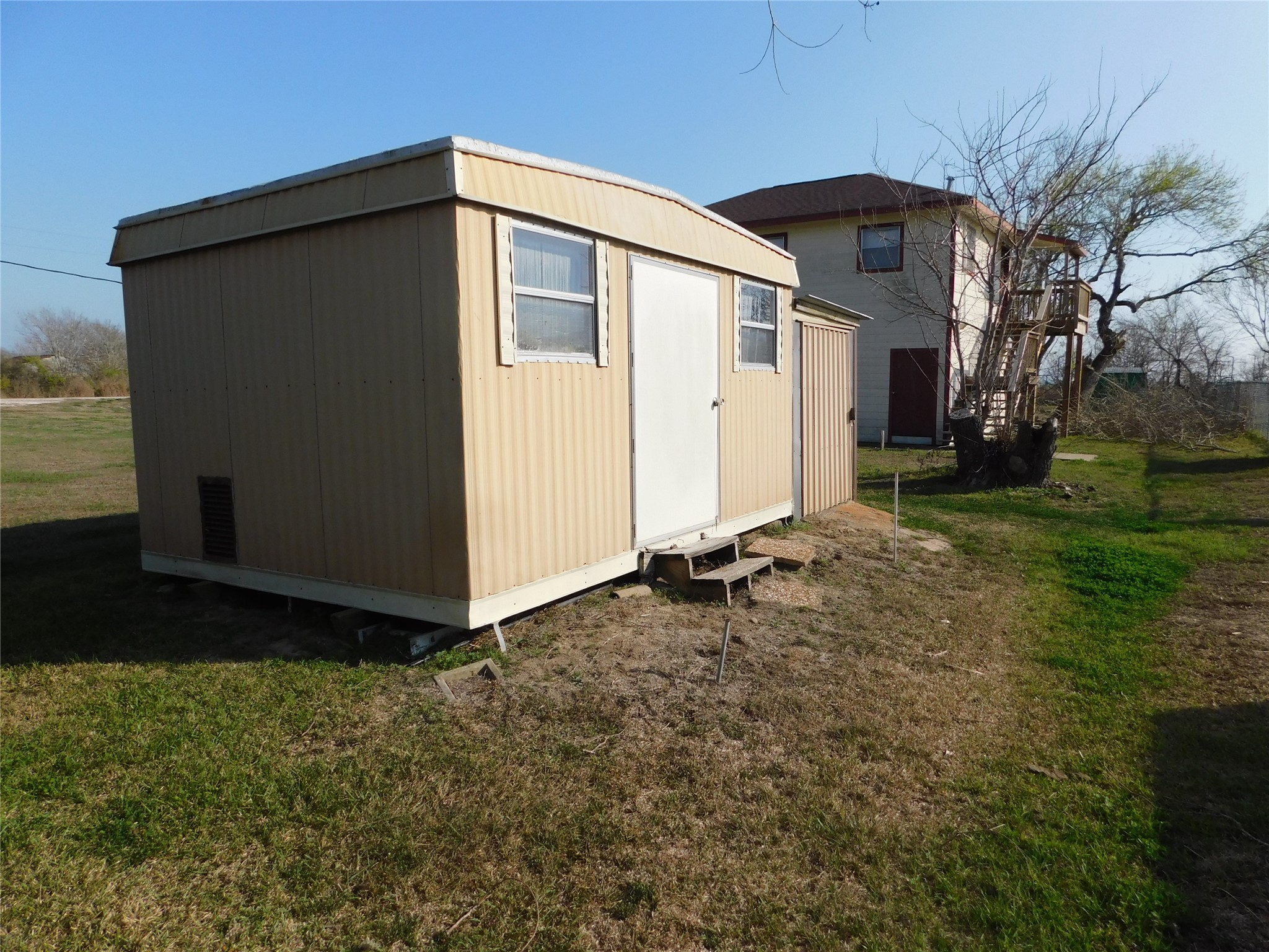 266 First Street Port Lavaca, TX 77979 - Photo 9 of 18 a view of a house with backyard