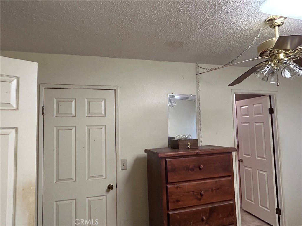 27250 Murrieta Road, Unit 347 Menifee, CA 92586 - Photo 17 of 39 a view of a dresser with mirror