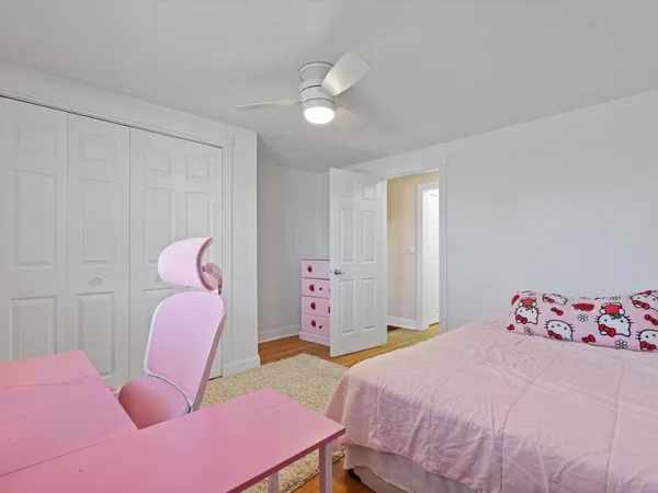 a bedroom with a bed and furniture