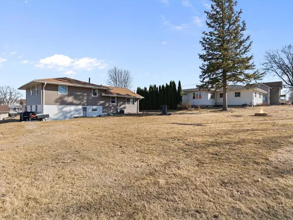 a view of car parked on the side of the road