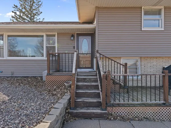 a view of a house with wooden door