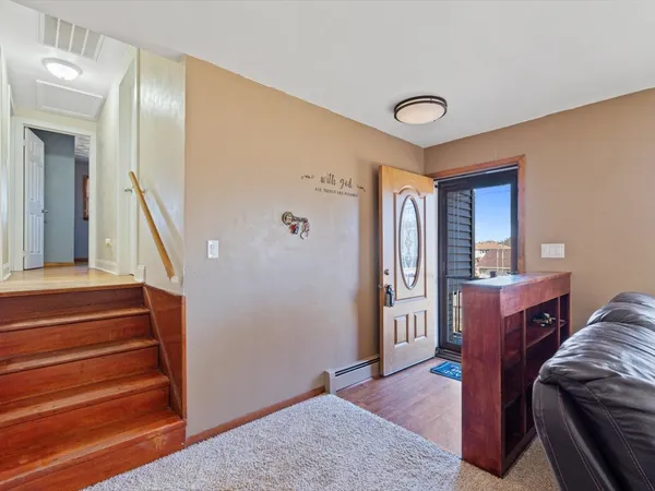 a view of livingroom with furniture and staircase