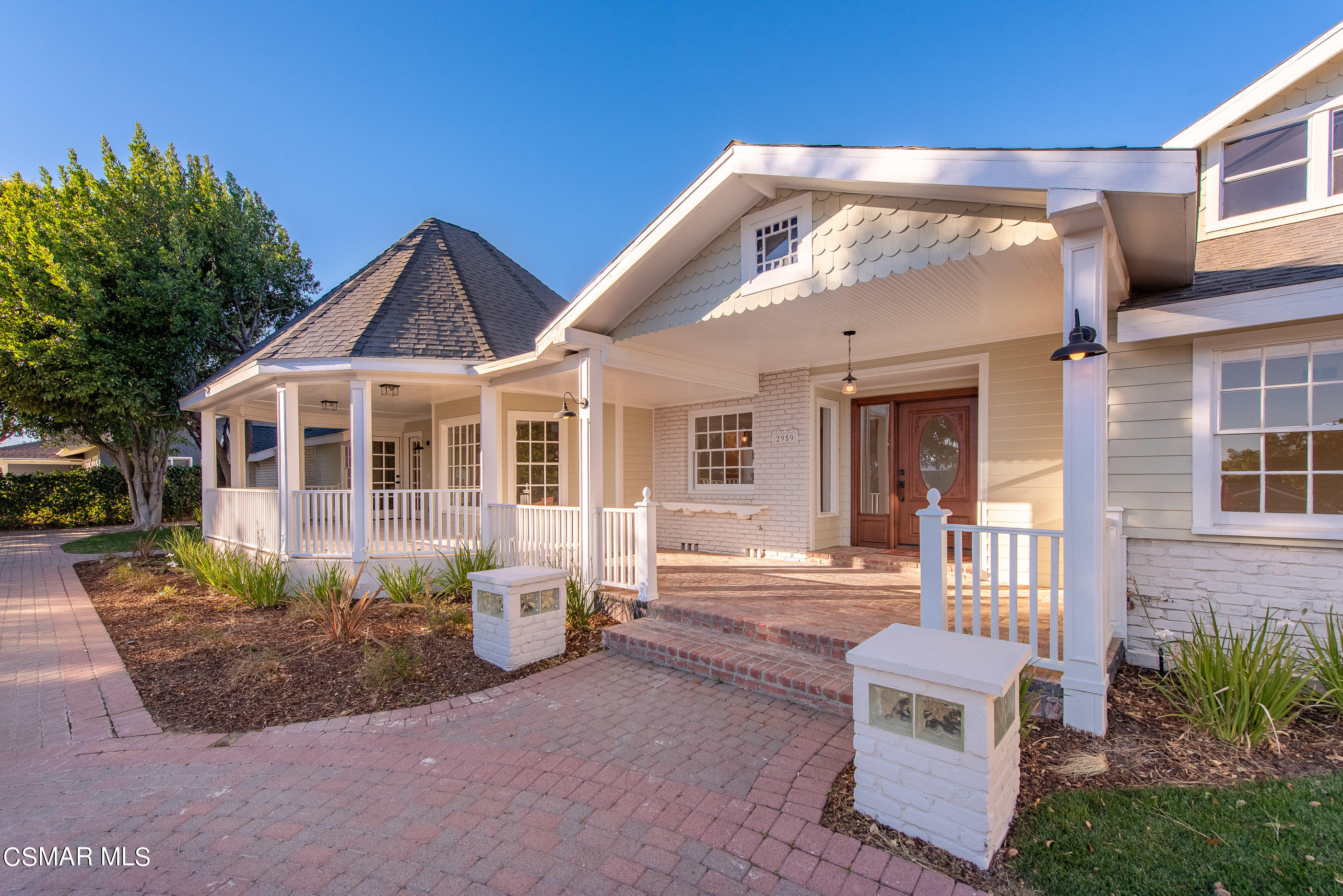 2959 Happy Lane Simi Valley, CA 93065 - Photo 12 of 92 a front view of a house with a porch