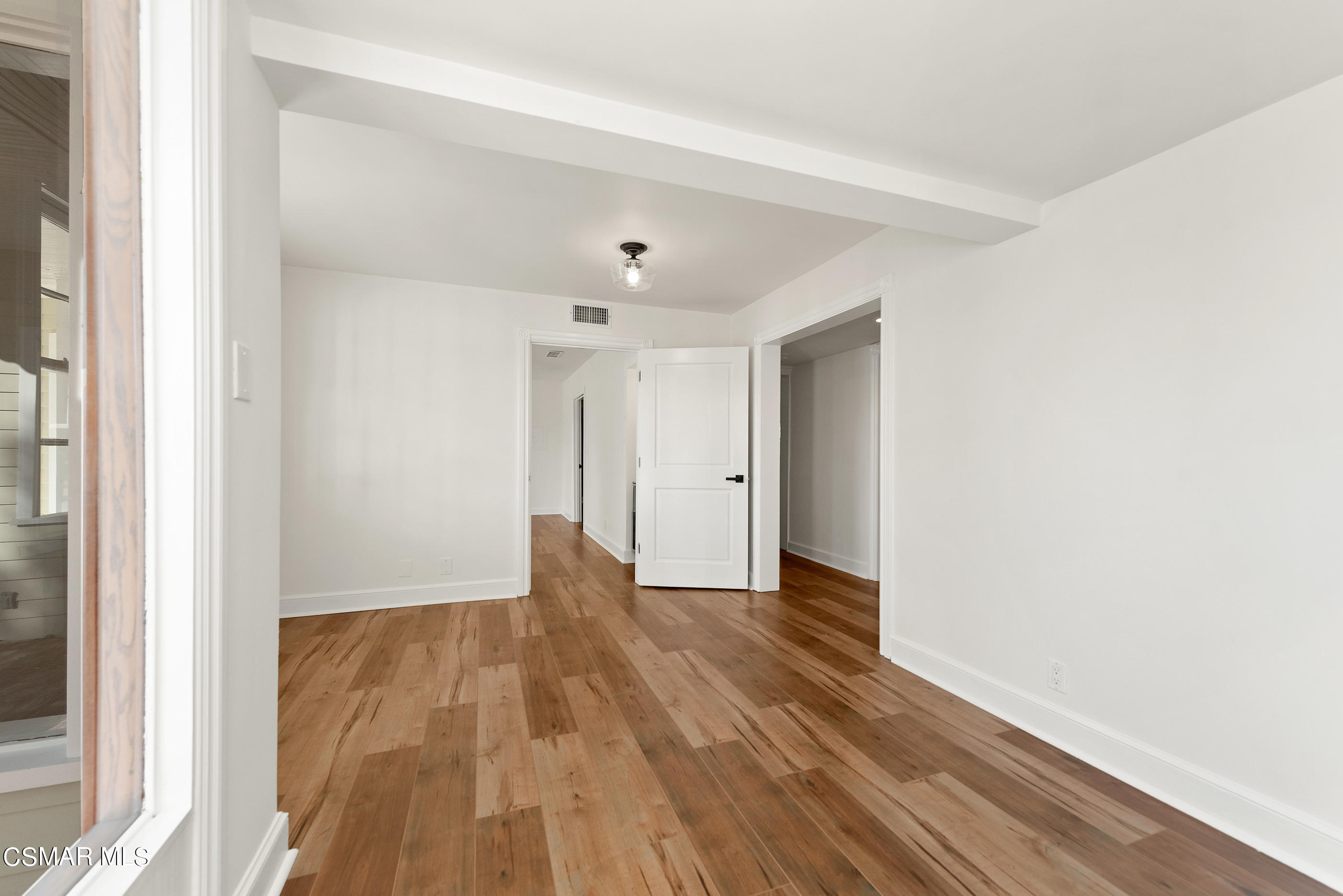 2959 Happy Lane Simi Valley, CA 93065 - Photo 13 of 92 a view of an empty room with wooden floor