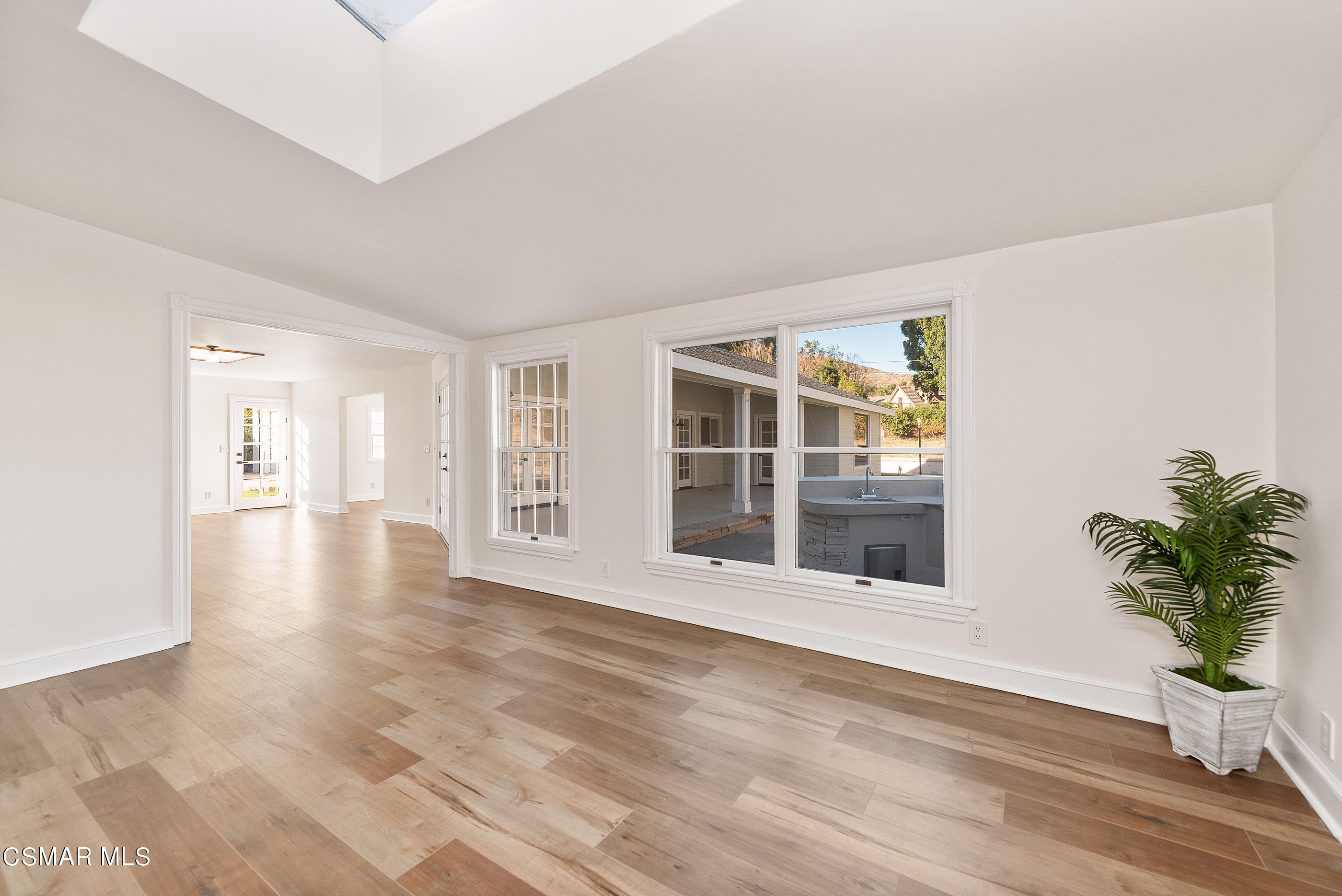 2959 Happy Lane Simi Valley, CA 93065 - Photo 31 of 92 a view of an empty room with a window and wooden floor