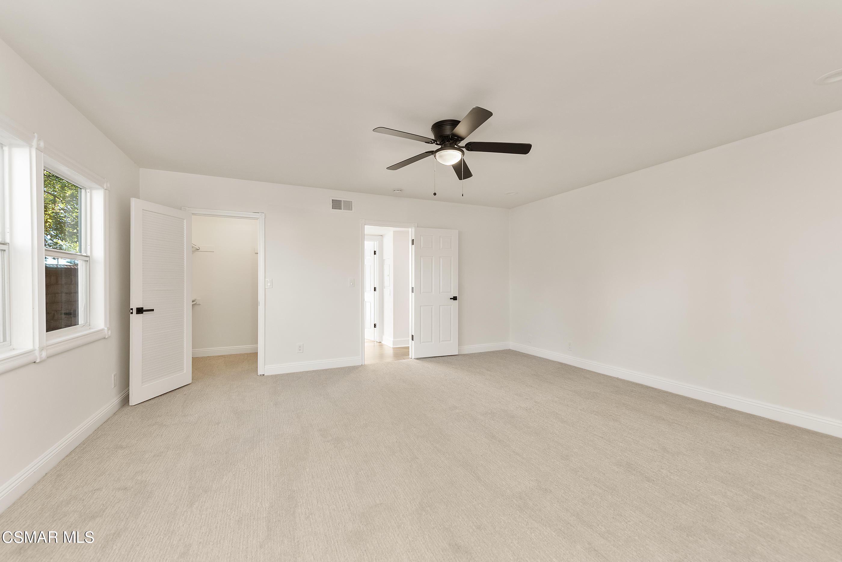 2959 Happy Lane Simi Valley, CA 93065 - Photo 49 of 92 a view of an empty room with a ceiling fan