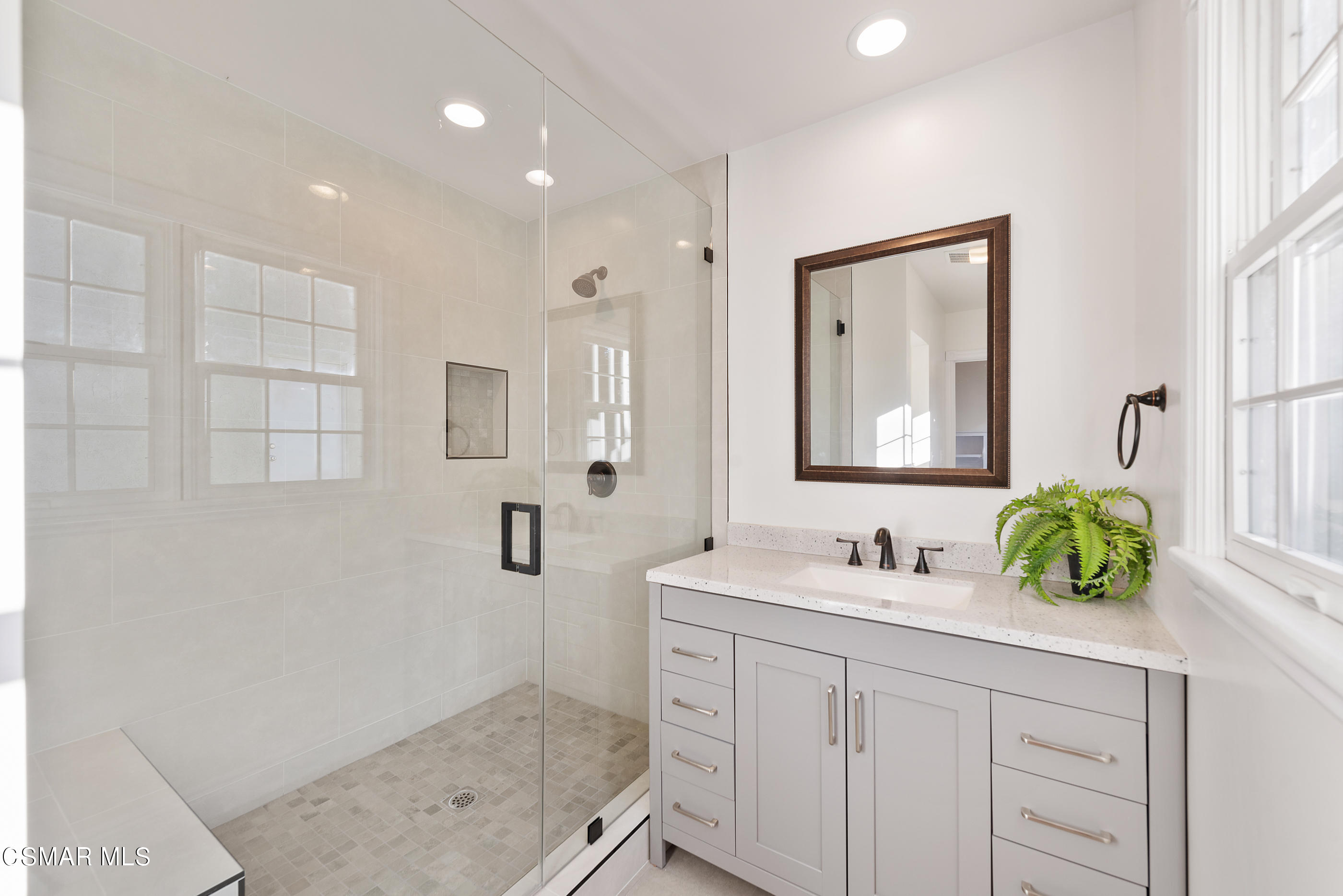 2959 Happy Lane Simi Valley, CA 93065 - Photo 59 of 92 a bathroom with a sink double vanity and mirror