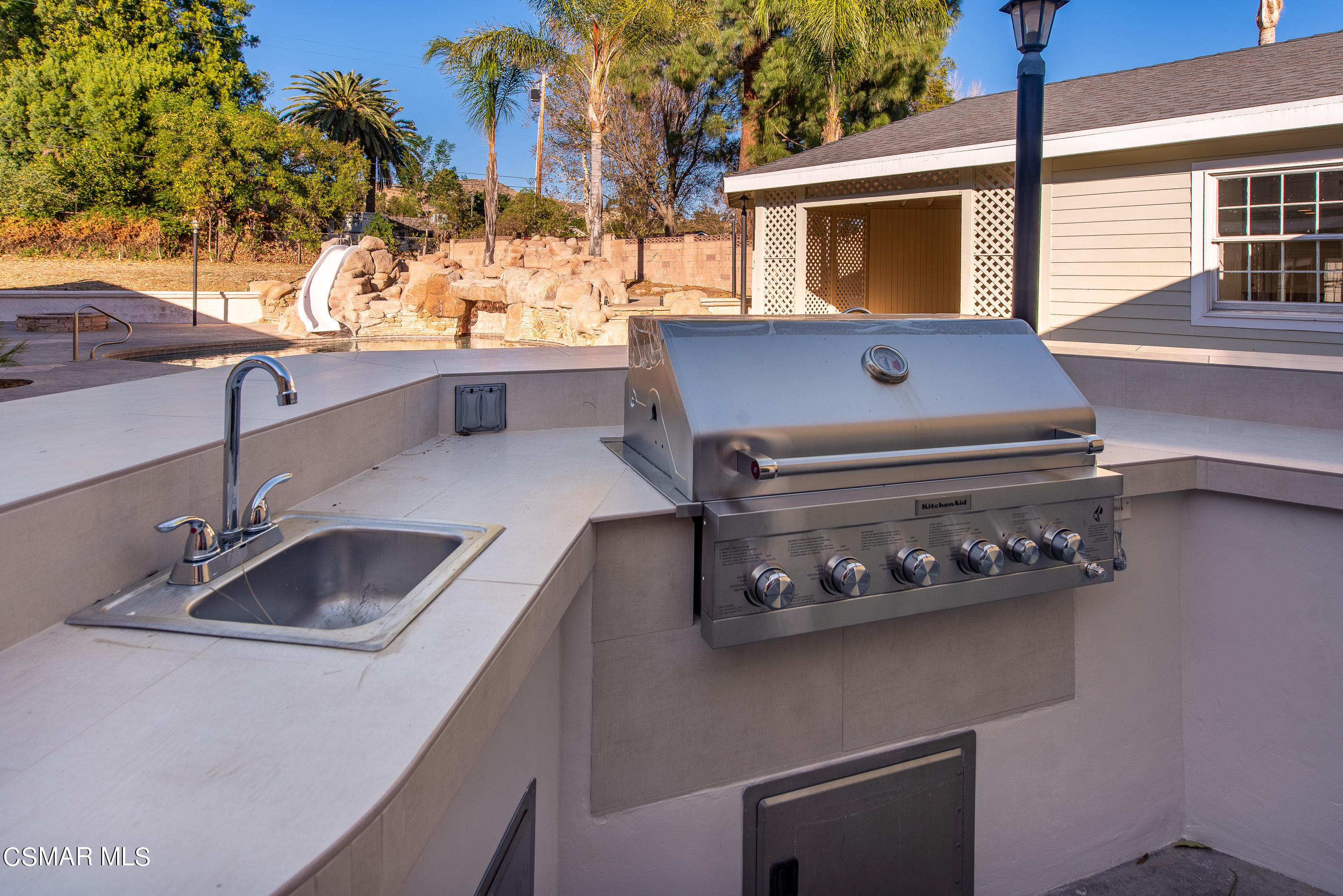 2959 Happy Lane Simi Valley, CA 93065 - Photo 70 of 92 a kitchen view with a sink and stove